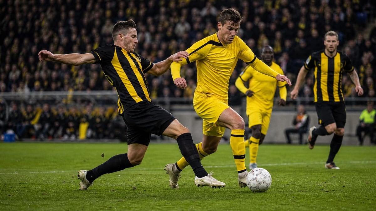 En fotbollsmatch mellan två lag – ett i svartgult och ett i gult.